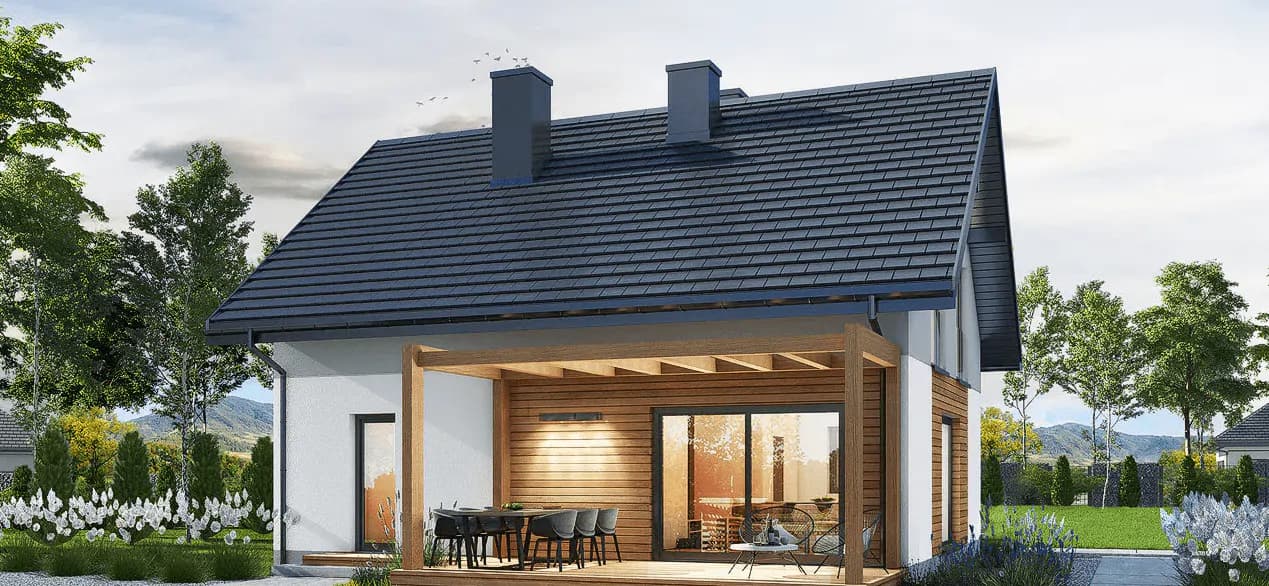 Schludny nowoczesny dom jednorodzinny od strony ogrodu; kameralnie, ciepło oświetlone patio; białe ściany, ciemny dach